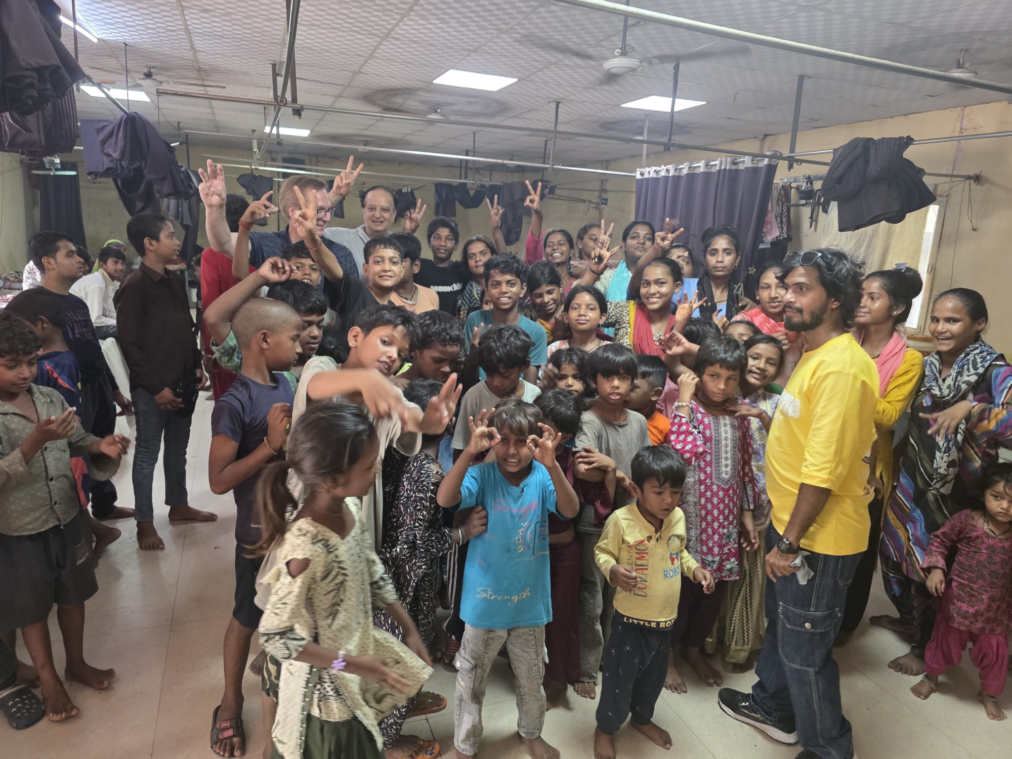 Students and local children together during a community visit in India
